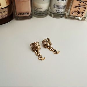 YSL Antiqued Gold Tone Drop Logo Earrings